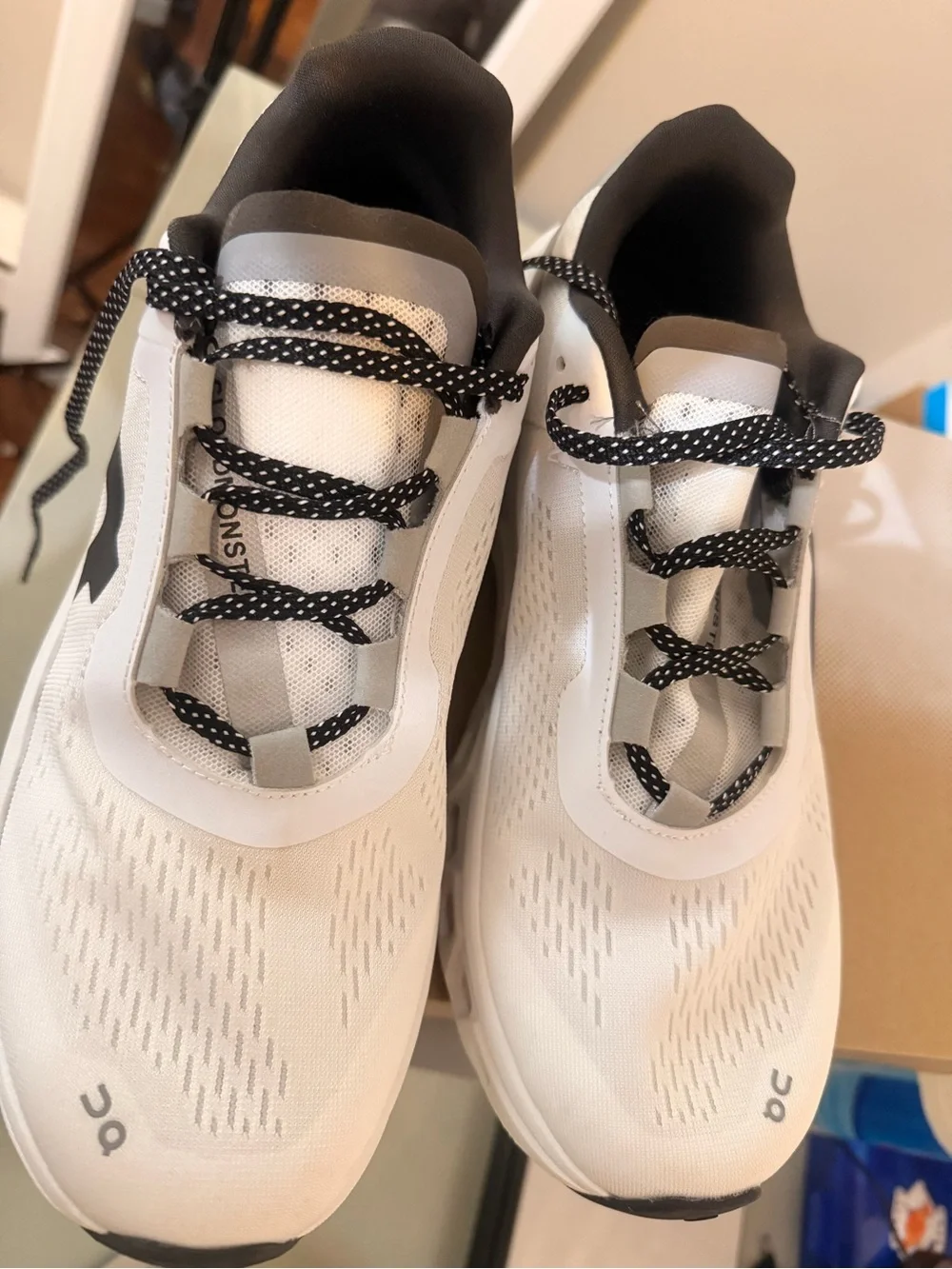 On Running White and Black CloudTec Sneakers